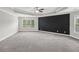 Spacious primary bedroom features a trey ceiling and ample natural light at 3705 Williams Point Dr, Cumming, GA 30028