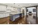 Spacious kitchen with granite countertops, stainless steel appliances, and a large center island at 3705 Williams Point Dr, Cumming, GA 30028