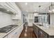 Modern kitchen featuring stainless steel appliances, granite counters, and white tile backsplash at 3705 Williams Point Dr, Cumming, GA 30028