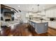 Modern eat-in kitchen with granite countertops, stainless appliances, and an island at 3705 Williams Point Dr, Cumming, GA 30028