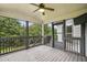 Screened porch with access door and mounted tv, great for entertainment at 3705 Williams Point Dr, Cumming, GA 30028