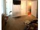 Simple bedroom layout with a mounted television and hardwood floors in the doorway at 205 Trickum Hills Ln, Woodstock, GA 30188