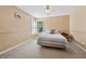 Inviting bedroom with neutral tones, a cozy bed, and a sunny window for natural light at 240 Old Plantation Way, Fayetteville, GA 30214