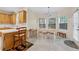 Inviting breakfast nook featuring a table and chairs, adjacent to the well-equipped kitchen at 240 Old Plantation Way, Fayetteville, GA 30214