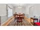Formal dining room with hardwood floors, elegant chandelier, and classic design at 240 Old Plantation Way, Fayetteville, GA 30214
