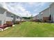 Spacious backyard with green lawn and fenced-in patios, perfect for outdoor activities at 3554 Bluebird Ct, Atlanta, GA 30331