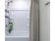Clean bathroom featuring a shower-tub, and minimalist decor, providing a spa-like experience at 3554 Bluebird Ct, Atlanta, GA 30331