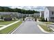 Gated community entrance with brick pillars and manicured landscaping at Aviary Park, creating an appealing first impression at 3554 Bluebird Ct, Atlanta, GA 30331
