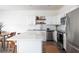 Bright kitchen with white cabinets, stainless steel appliances, and quartz countertops at 3554 Bluebird Ct, Atlanta, GA 30331