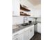 Double sink with granite countertop and stainless steel dishwasher in kitchen at 3554 Bluebird Ct, Atlanta, GA 30331