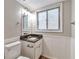 Bathroom shows granite countertop, vanity and window at 5215 Mainstreet Park Dr, Stone Mountain, GA 30088