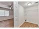 Laundry room with wood-look floors, shelving, and washer/dryer hookups at 5215 Mainstreet Park Dr, Stone Mountain, GA 30088