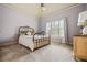 Bedroom with ample light from window at 217 Fernwood Pl, Woodstock, GA 30188