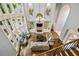 Bright living room featuring a fireplace, built-in shelves, and tall windows providing natural light at 217 Fernwood Pl, Woodstock, GA 30188