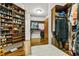 A spacious walk-in closet with custom shelving offers plenty of room for your shoe collection at 217 Fernwood Pl, Woodstock, GA 30188
