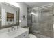 Bathroom featuring new shower with tile and glass door at 3900 Baluster Ct, Suwanee, GA 30024