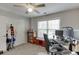 Bedroom featuring desk area with fan and closet at 3900 Baluster Ct, Suwanee, GA 30024