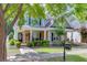 Charming two-story home with beautifully landscaped yard at 3900 Baluster Ct, Suwanee, GA 30024