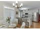Spacious kitchen featuring granite countertops, stainless steel appliances, and a breakfast bar at 3900 Baluster Ct, Suwanee, GA 30024