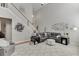 Open living room featuring stairs, comfortable seating, and neutral colors at 3900 Baluster Ct, Suwanee, GA 30024
