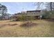 Picture of a sprawling backyard featuring a deck, lower patio, and lush greenery at 4225 Parkridge Dr, Powder Springs, GA 30127