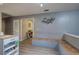 Eat-in kitchen boasts stylish decor, bench seating, and open layout at 4225 Parkridge Dr, Powder Springs, GA 30127