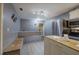 Eat-in kitchen with island and bench seating offers a cozy dining space at 4225 Parkridge Dr, Powder Springs, GA 30127