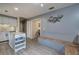Eat-in kitchen features island, built-in bench, and modern decor at 4225 Parkridge Dr, Powder Springs, GA 30127