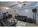 Cozy living room featuring plush seating, ambient lighting, and entertainment setup at 4225 Parkridge Dr, Powder Springs, GA 30127