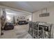 Open-concept living and dining area features comfortable seating, a stylish rug, and carpet at 4225 Parkridge Dr, Powder Springs, GA 30127