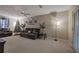 Spacious living area features carpeted floors, ceiling fan, comfortable seating, and lots of natural light at 4225 Parkridge Dr, Powder Springs, GA 30127