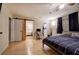 Bright main bedroom features a work area and en-suite bathroom at 4225 Parkridge Dr, Powder Springs, GA 30127