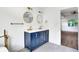 Bathroom with a soaking tub, dual sinks, and an open door to the Primary bedroom at 597 Woodcrest Manor Dr, Stone Mountain, GA 30083
