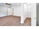 A light bedroom showcases a walk-in closet with hardwood floors at 597 Woodcrest Manor Dr, Stone Mountain, GA 30083