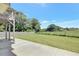 Spacious backyard featuring lush green grass and a fenced perimeter at 932 Melville Dr, Stockbridge, GA 30281