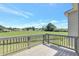 Enjoy the outdoors from this deck overlooking a lush backyard and serene landscape at 932 Melville Dr, Stockbridge, GA 30281
