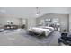 Spacious main bedroom with sitting area, vaulted ceiling, and ceiling fan at 932 Melville Dr, Stockbridge, GA 30281