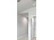 Bright bedroom featuring a ceiling fan and a door that leads to a walk-in closet at 932 Melville Dr, Stockbridge, GA 30281