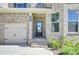 Inviting entryway with a glass-paneled door, set in a charming brick facade at 932 Melville Dr, Stockbridge, GA 30281