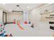 Spacious playroom featuring carpeted floor and neutral walls and multiple entrances at 4472 Cavallon Nw Way, Acworth, GA 30101