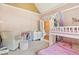 Bright bedroom with a bunk bed, a cozy reading nook, and ample storage at 4472 Cavallon Nw Way, Acworth, GA 30101