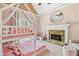Charming bedroom with a bunk bed, a fireplace, and soft pastel colors at 4472 Cavallon Nw Way, Acworth, GA 30101