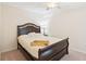 Comfortable bedroom with wood bed frame, neutral decor, and a cozy ambiance at 4472 Cavallon Nw Way, Acworth, GA 30101