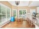 Cozy breakfast nook filled with natural light, wood floors, and casual seating at 4472 Cavallon Nw Way, Acworth, GA 30101