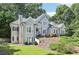 Charming two-story home featuring a stucco exterior and lush landscaping, perfect for curb appeal at 4472 Cavallon Nw Way, Acworth, GA 30101