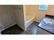 Clean bathroom with a tub, vanity, and patterned tile flooring at 4707 Golod Way, Lithonia, GA 30038