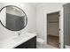 Modern bathroom features stylish finishes, single vanity, and a walk-in shower at 125 Maison Court, Roswell, GA 30076