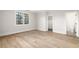 Bright bedroom with hardwood floors, natural light, closet and full ensuite bathroom at 125 Maison Court, Roswell, GA 30076
