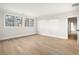 Bright bedroom with hardwood floors and natural light is a blank canvas at 125 Maison Court, Roswell, GA 30076