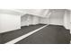 Attic converted to bonus room, featuring a long mirrored wall and neutral carpet at 125 Maison Court, Roswell, GA 30076